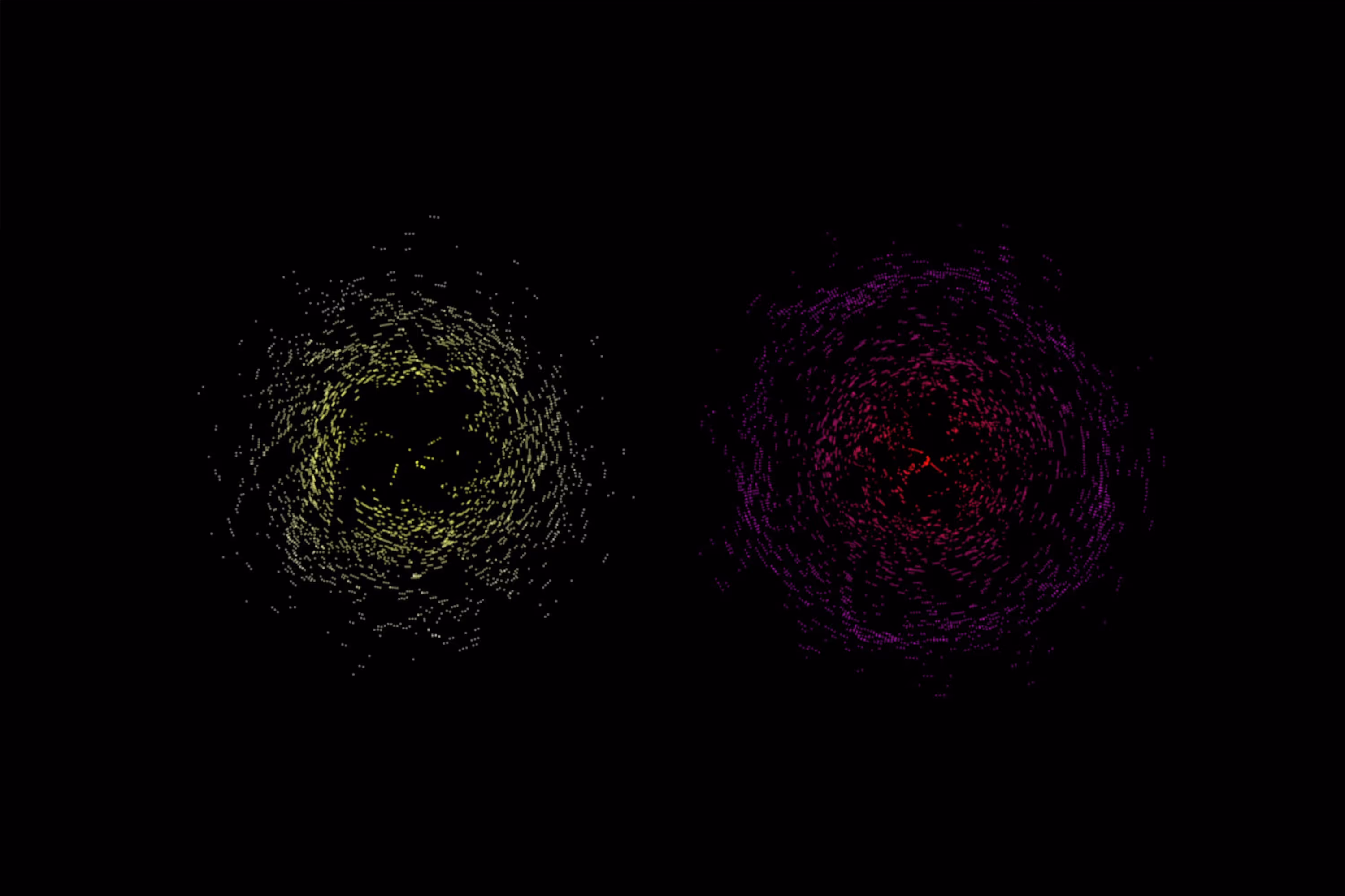 Two swirl-like clusters of glowing dots on a black background, one yellowish on the left and one reddish-purple on the right, created using p5.js by analyzing sound volumes.